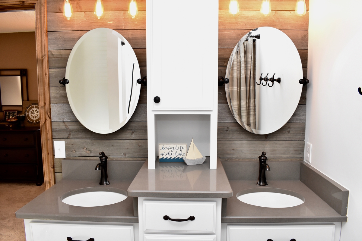 lake inspired, floating mirrors,  barnwood-like wall covering, oil-rubbed bronze faucet