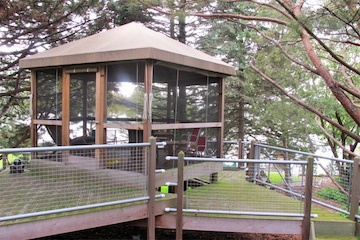 Multi-level deck retreat with screen porch
